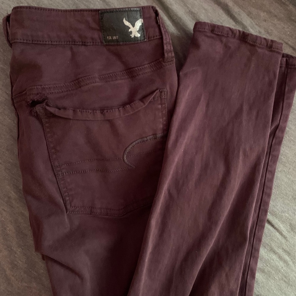 AE Grape colored skinny jeggings